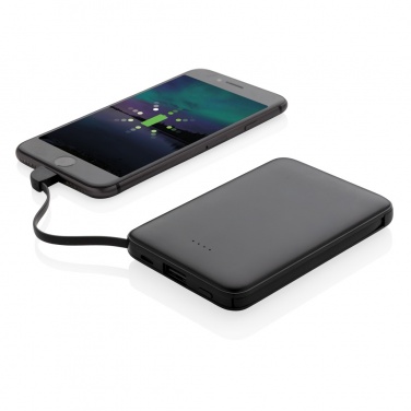 Logotrade profilreklam bild: 5.000 mAh powerbank i fickformat med integrerade kablar